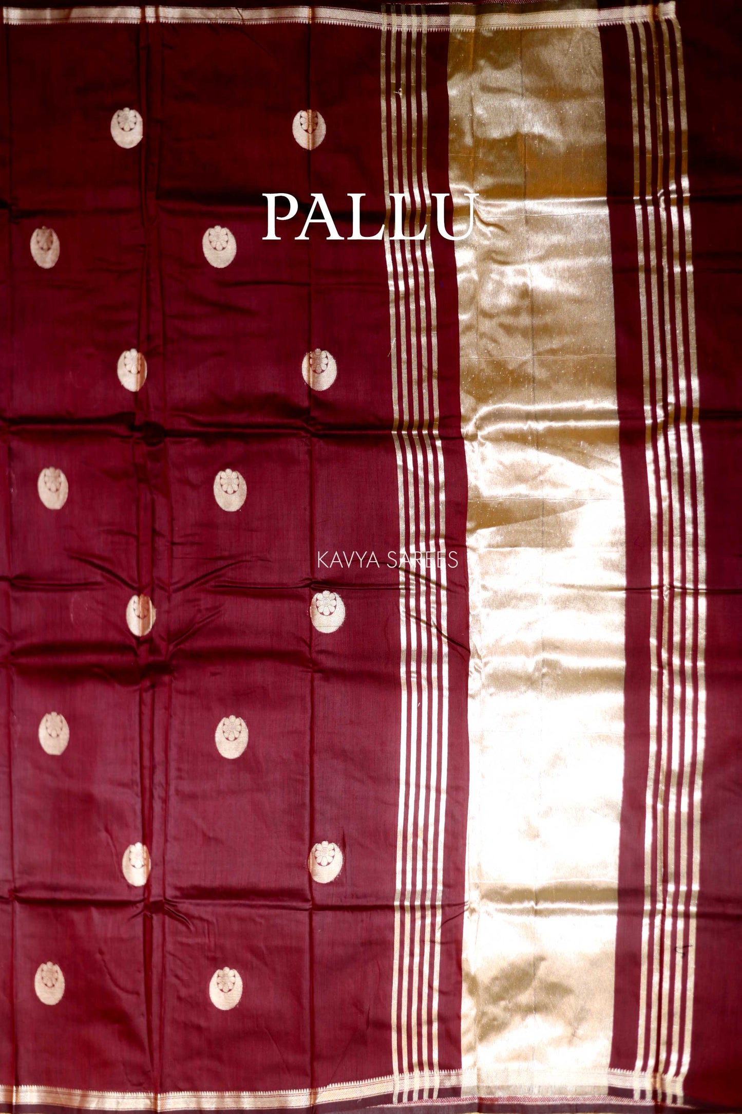 Sophisticated deep maroon Chanderi saree designed with traditional silver woven accents
