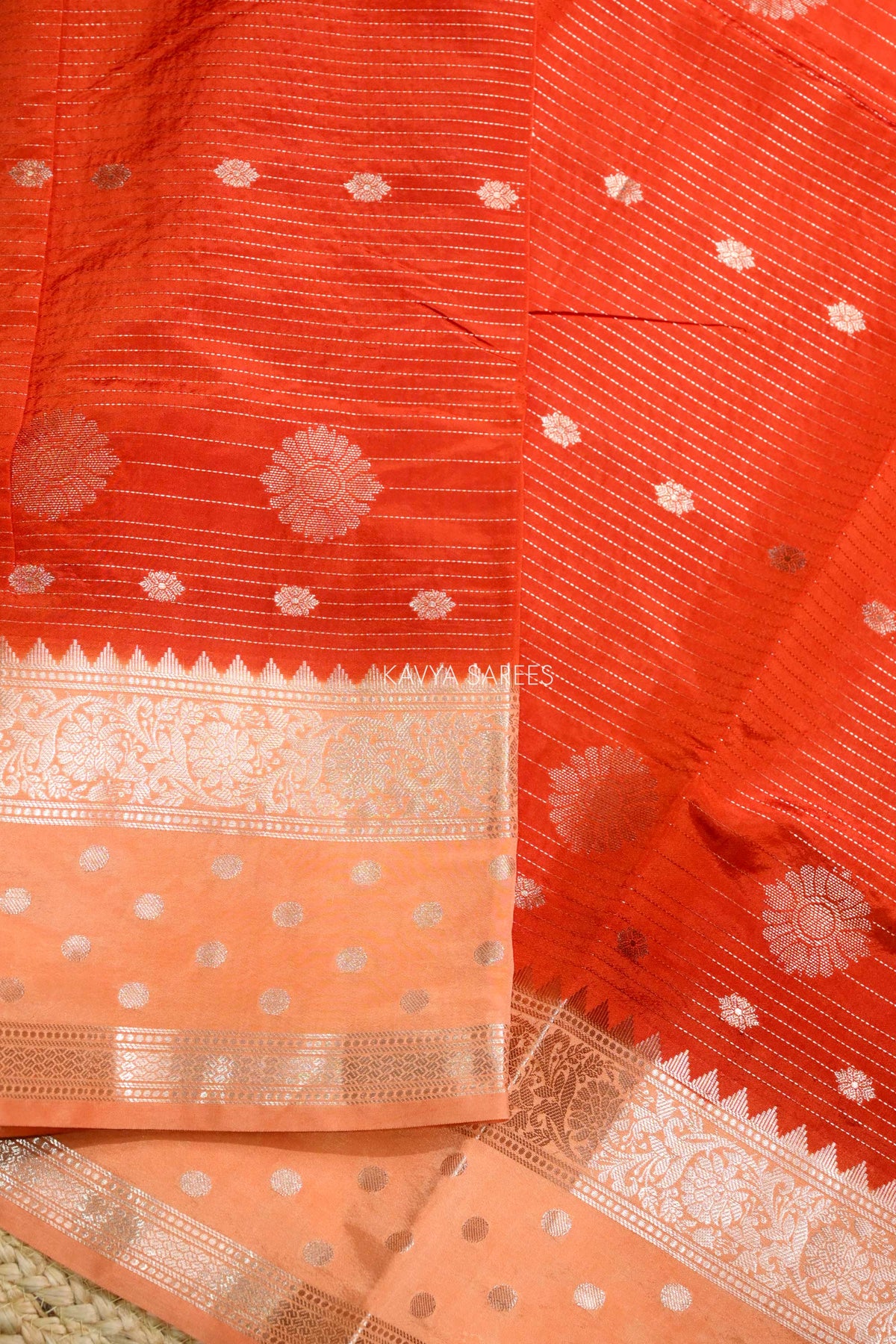 Vibrant Orange Semi Raw Silk Saree with Silver Floral Zari Motifs & Designer Border