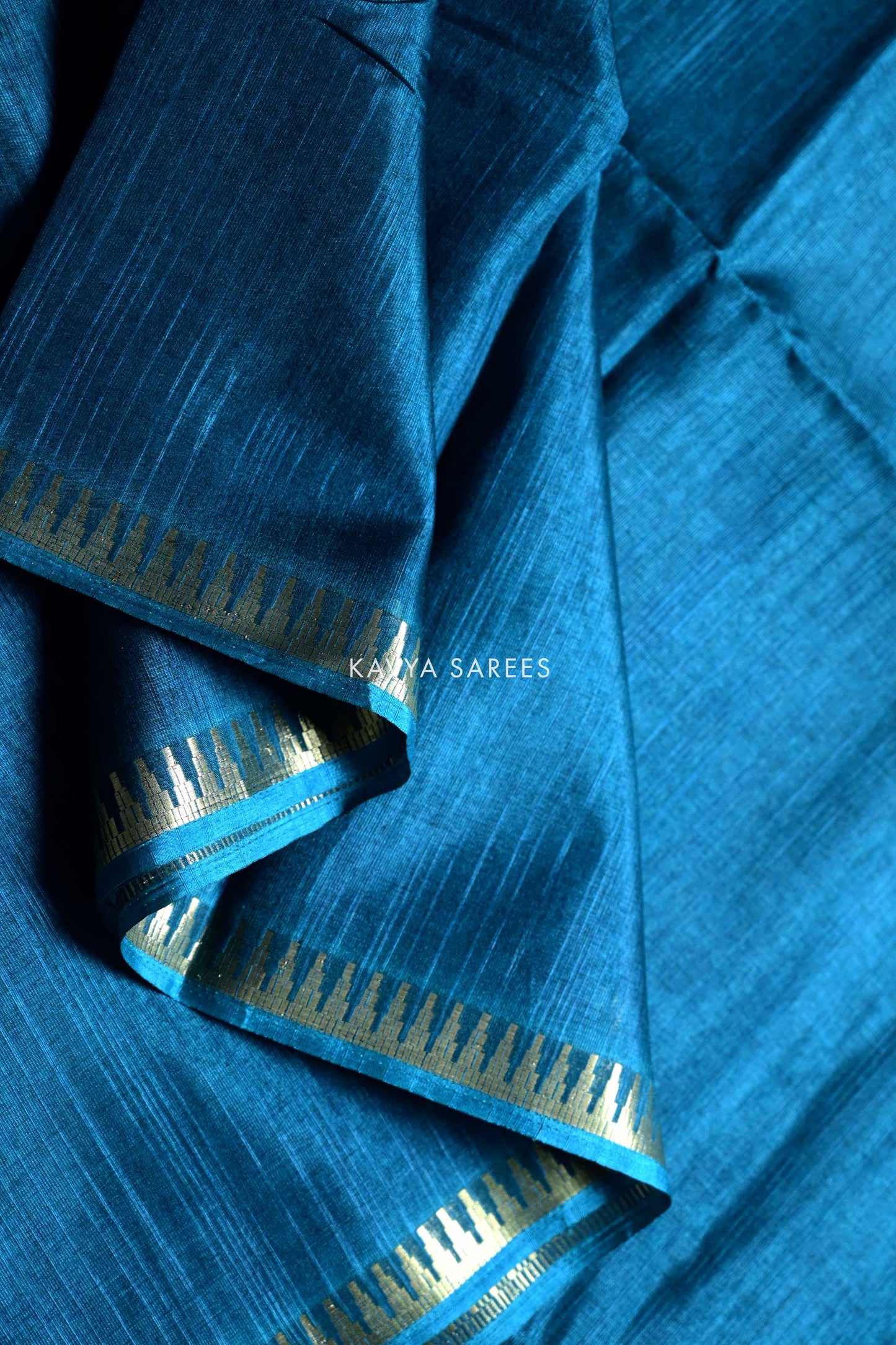 Peacock Blue Plain Tussar Silk Saree with Rich Zari Border