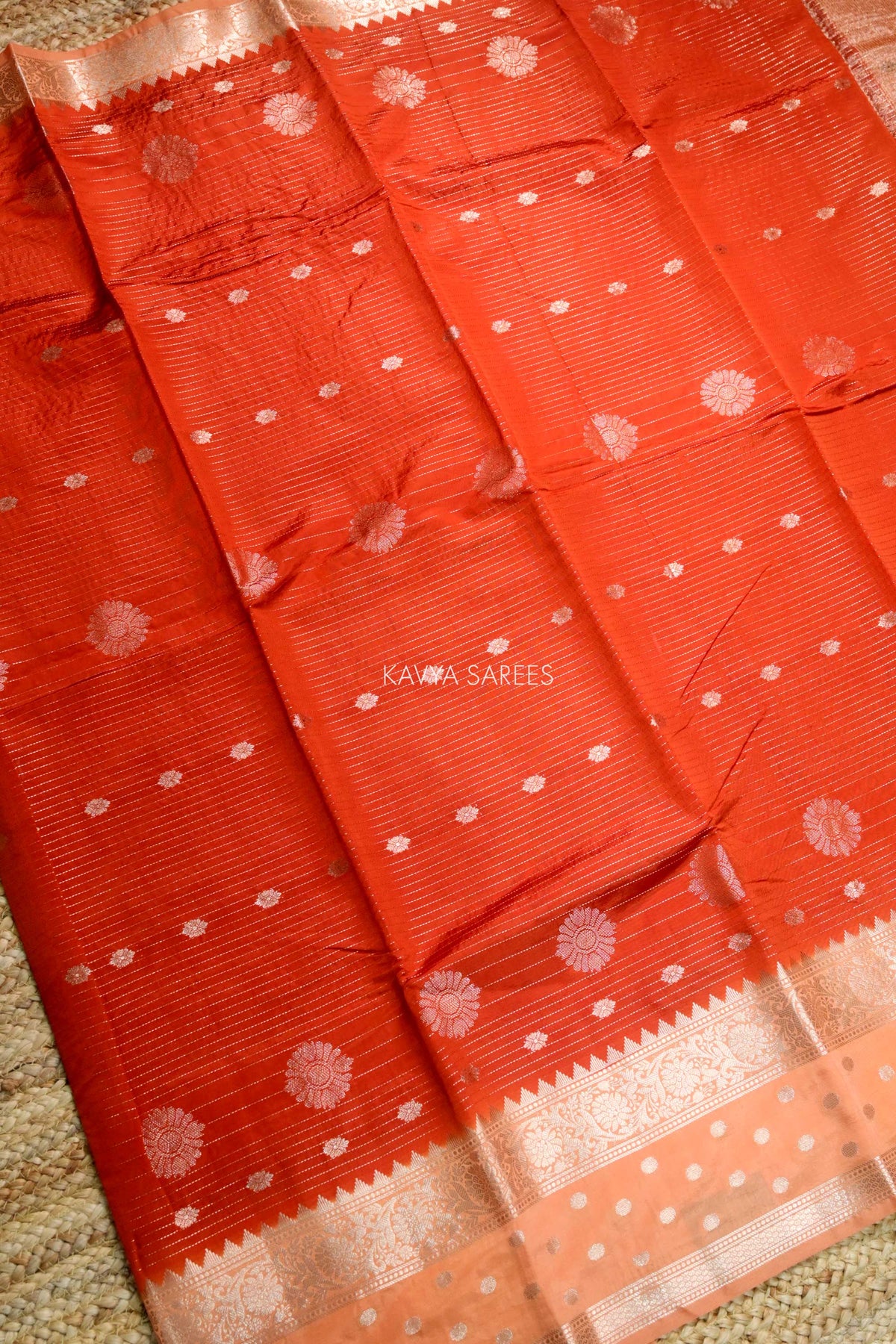 Vibrant Orange Semi Raw Silk Saree with Silver Floral Zari Motifs & Designer Border