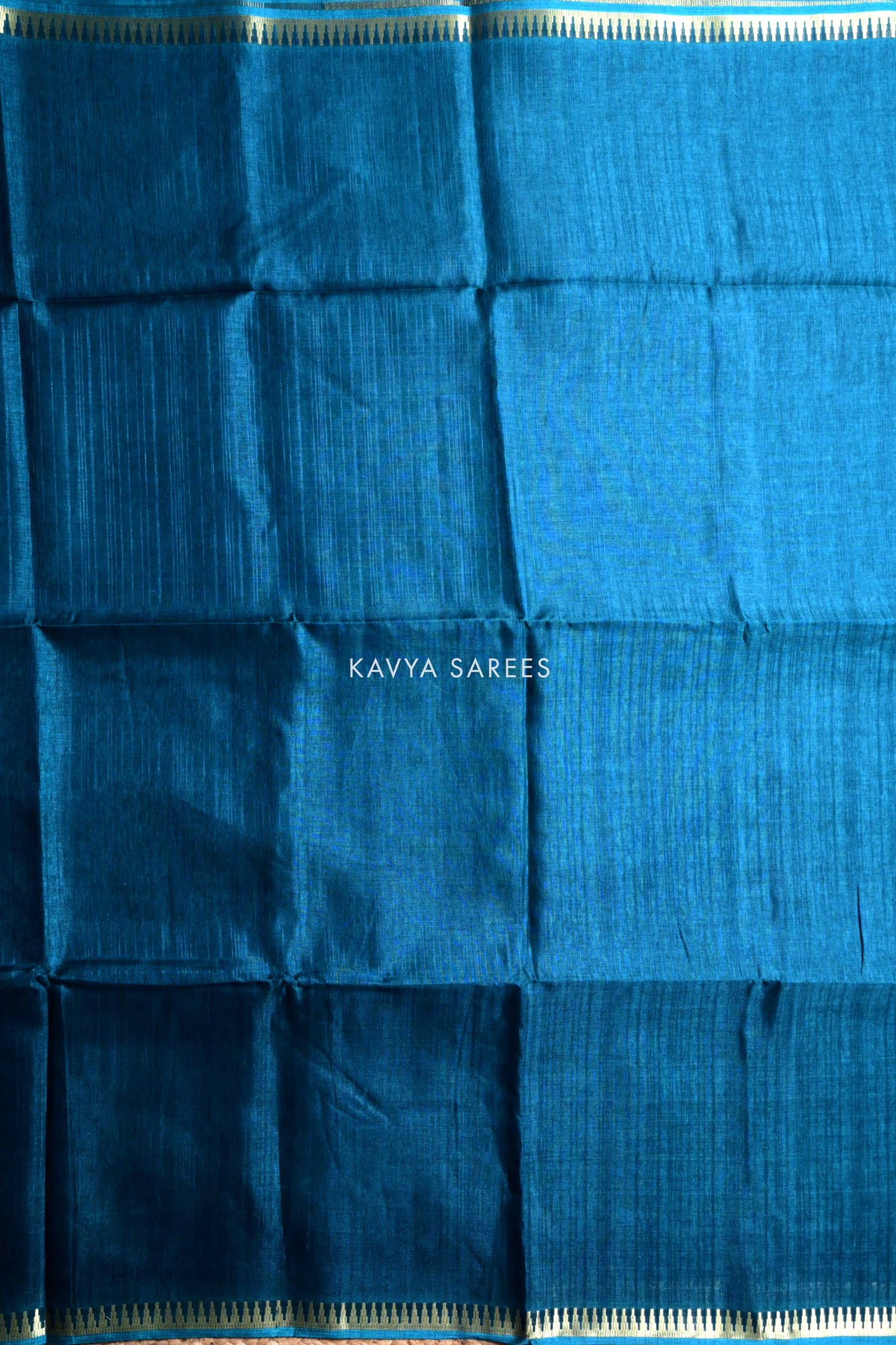 Peacock Blue Plain Tussar Silk Saree with Rich Zari Border