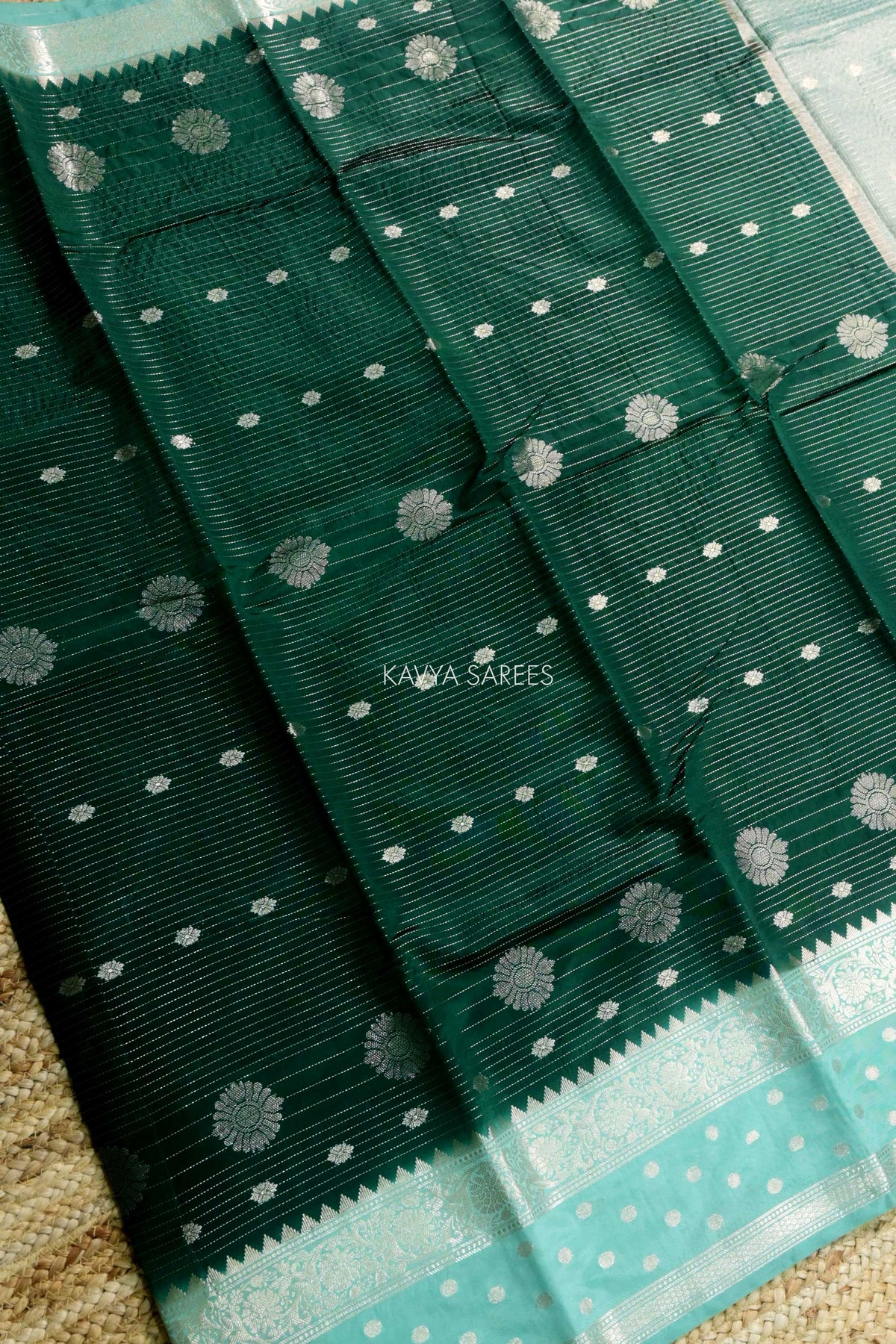 Bottle Green Semi Raw Silk Saree with Silver Floral Zari Motifs & Elegant Zari Border