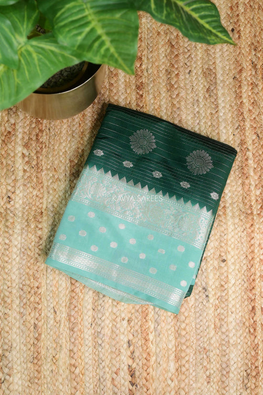 Bottle Green Semi Raw Silk Saree with Silver Floral Zari Motifs & Elegant Zari Border
