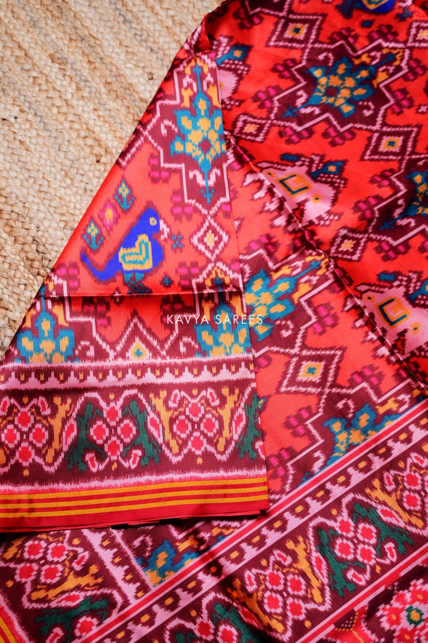 Coral Pink Patola Silk Saree with Traditional Geometric Design