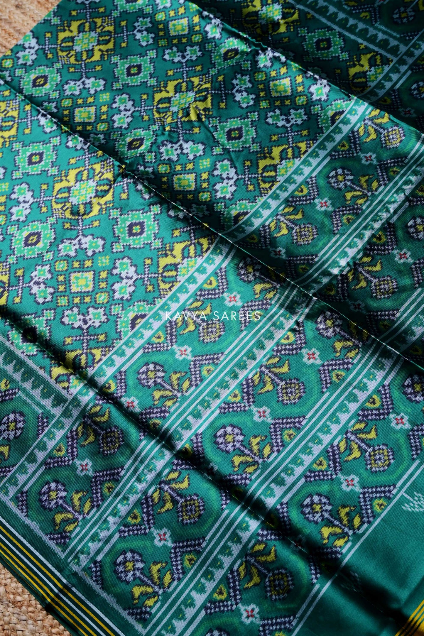Sea Green Patola Silk Saree with Floral Ikat Motifs