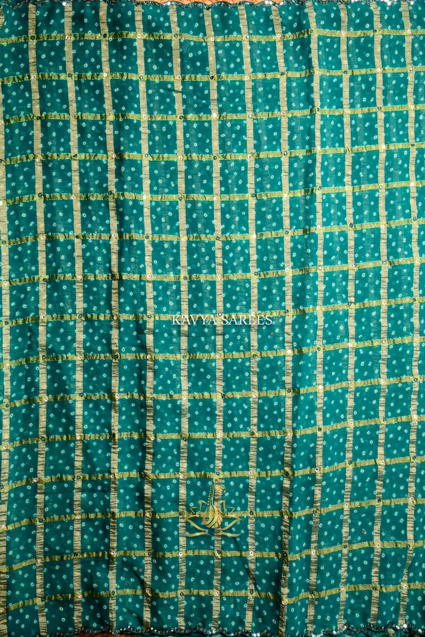 Teal Blue Bandhani Saree with Elegant Gold Checks & Designer Border