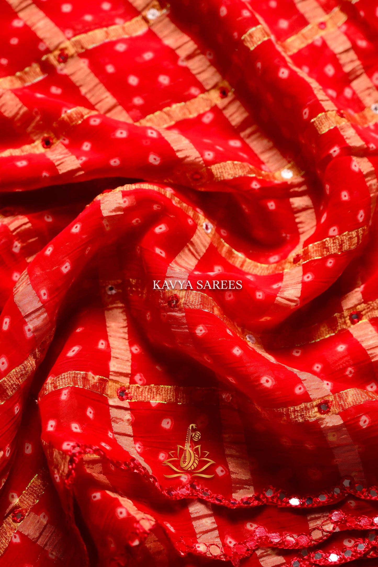 Bright Red Bandhani Saree with Mirror Work & Decorative Lace Finish