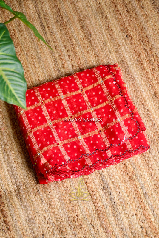 Bright Red Bandhani Saree with Mirror Work & Decorative Lace Finish