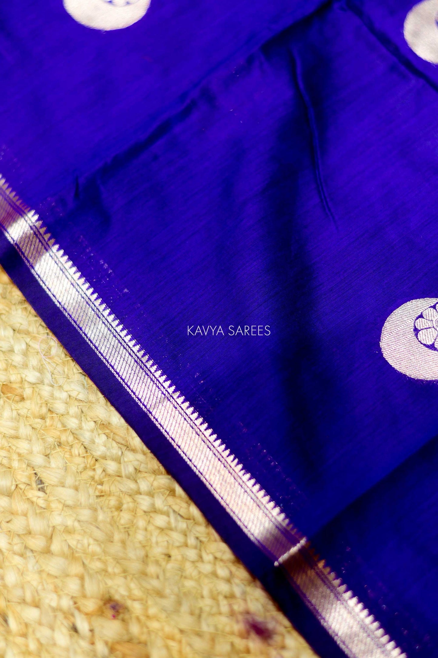 Rich violet Chanderi saree with elegant silver zari motifs and refined woven border