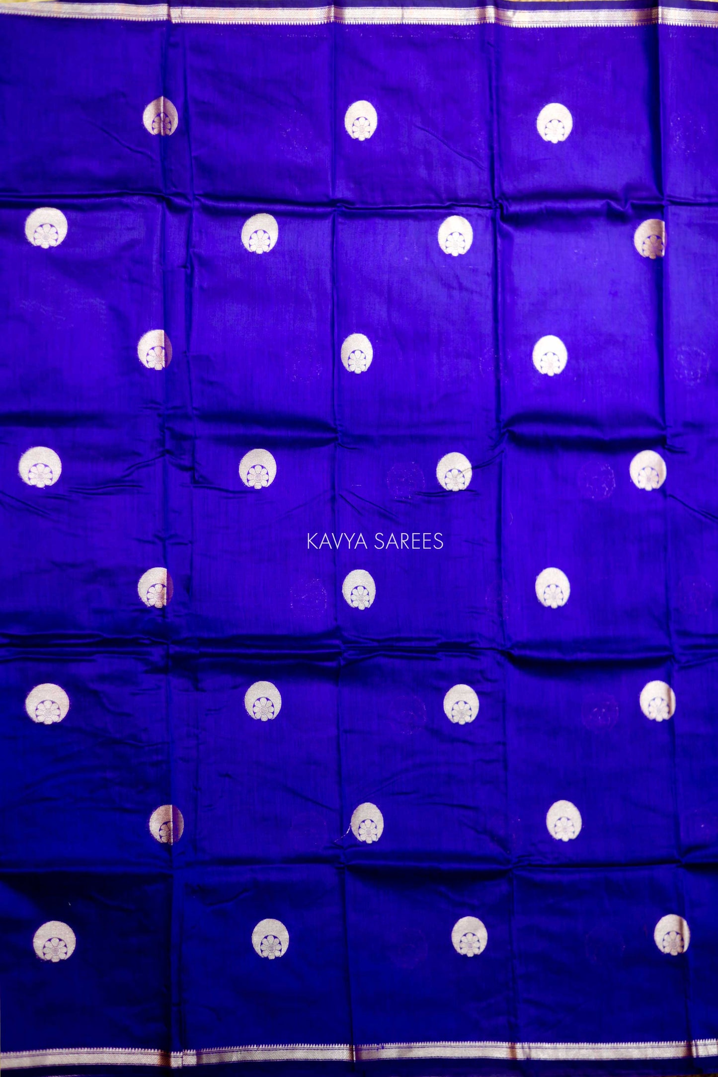 Rich violet Chanderi saree with elegant silver zari motifs and refined woven border