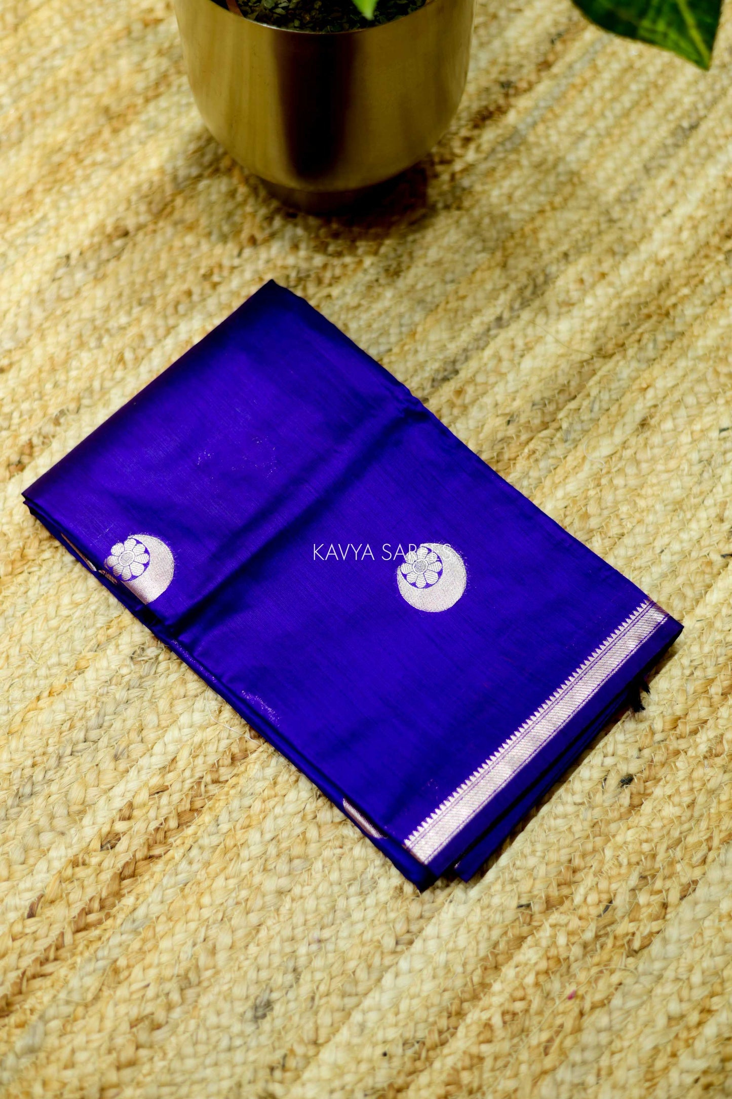 Rich violet Chanderi saree with elegant silver zari motifs and refined woven border