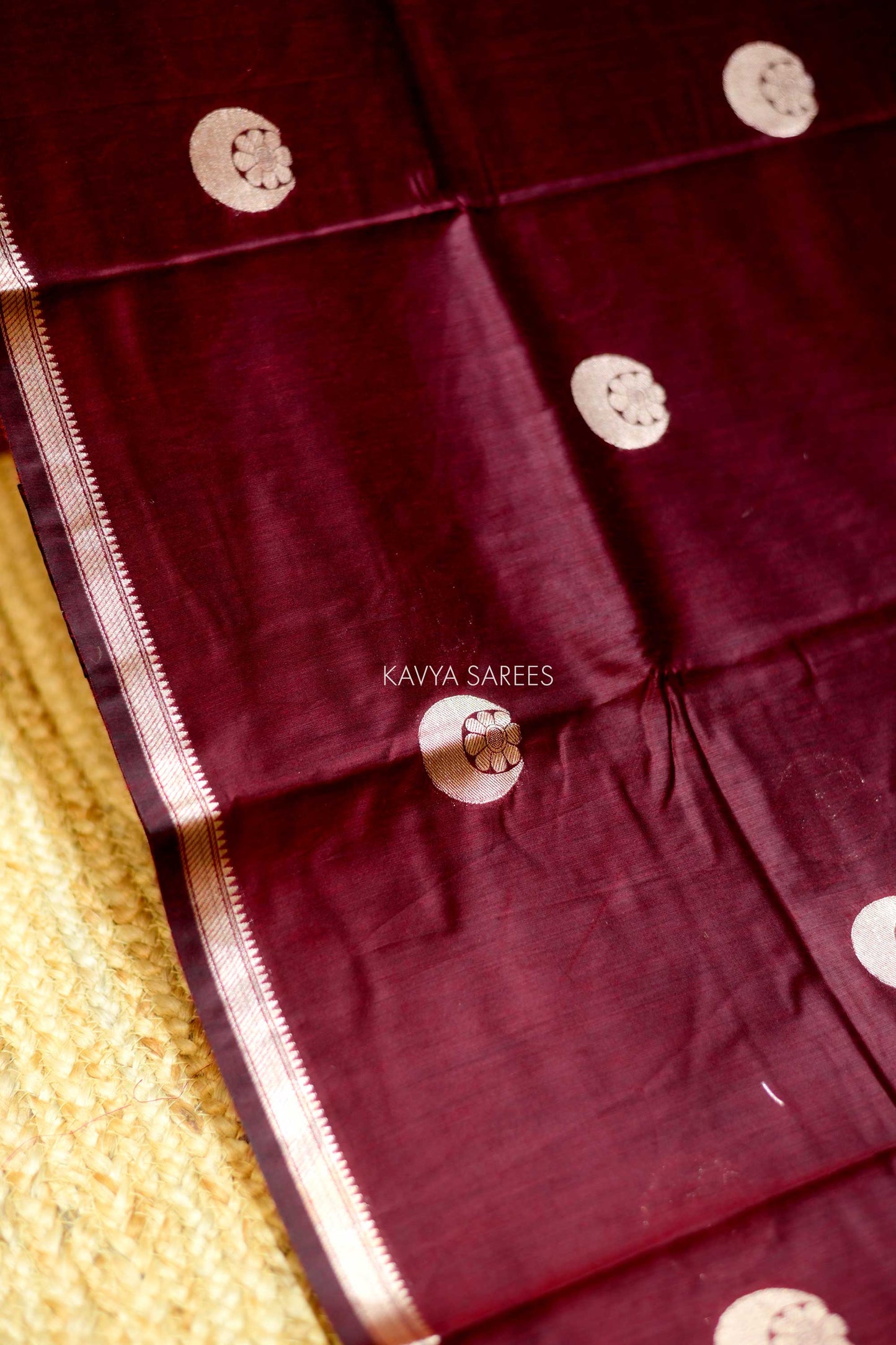 Sophisticated deep maroon Chanderi saree designed with traditional silver woven accents
