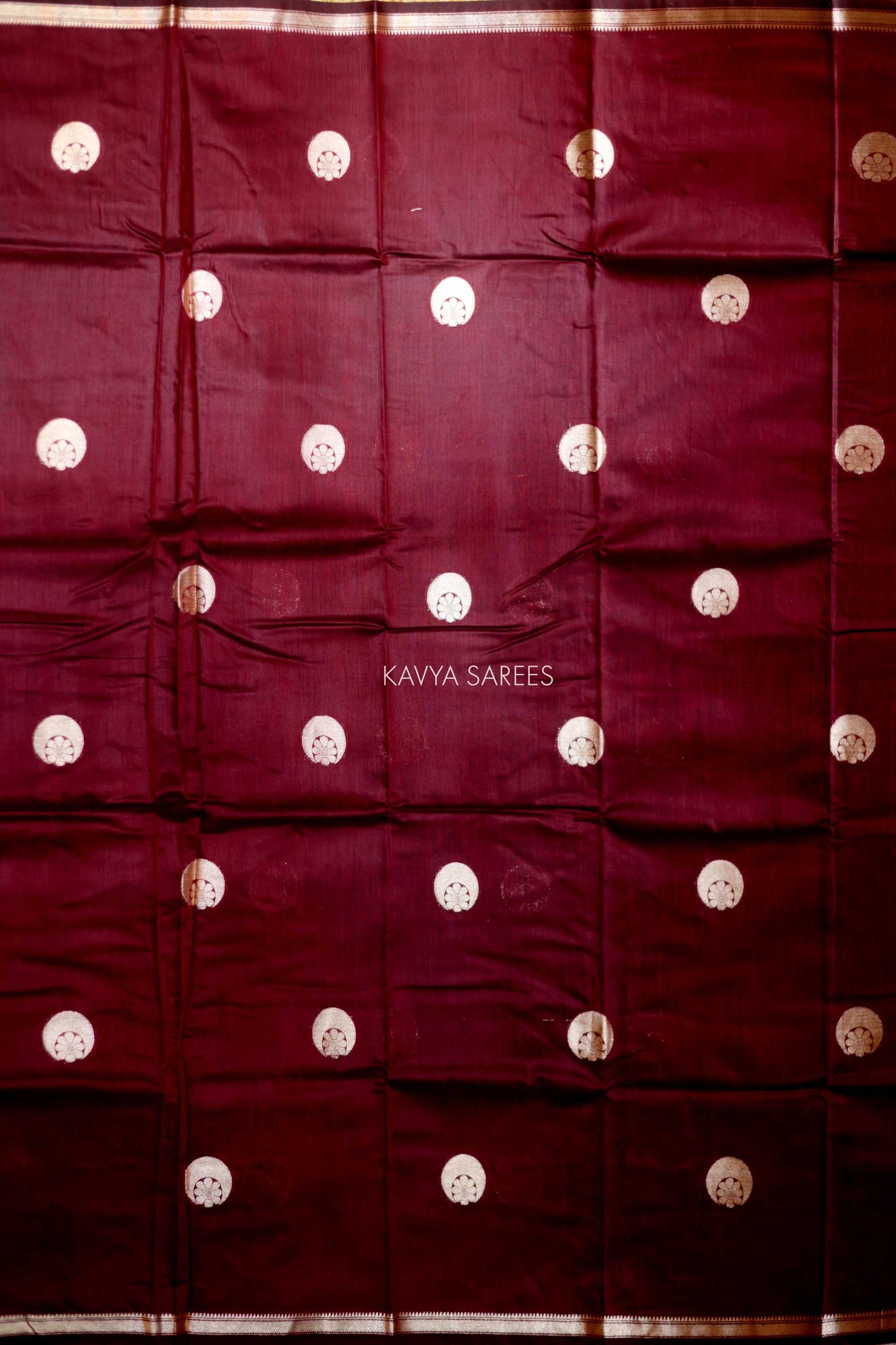 Sophisticated deep maroon Chanderi saree designed with traditional silver woven accents