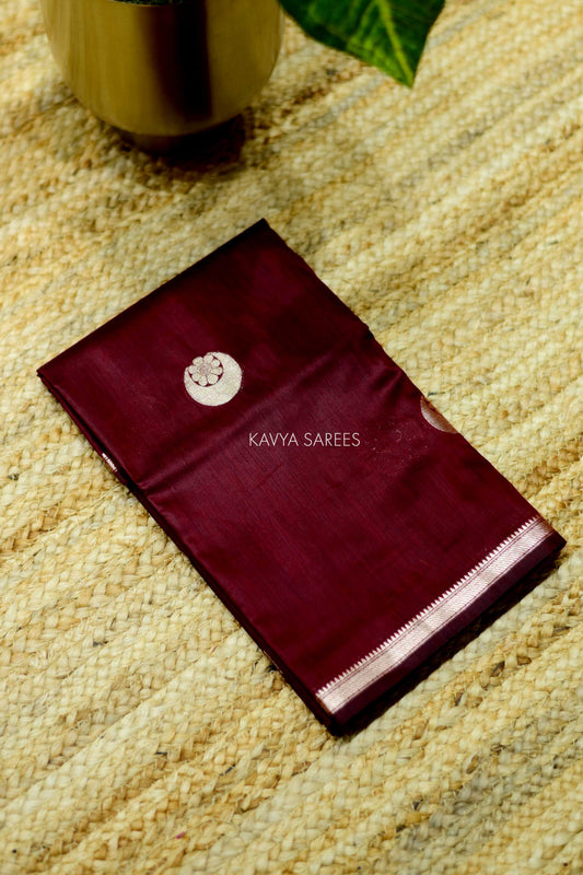 Sophisticated deep maroon Chanderi saree designed with traditional silver woven accents