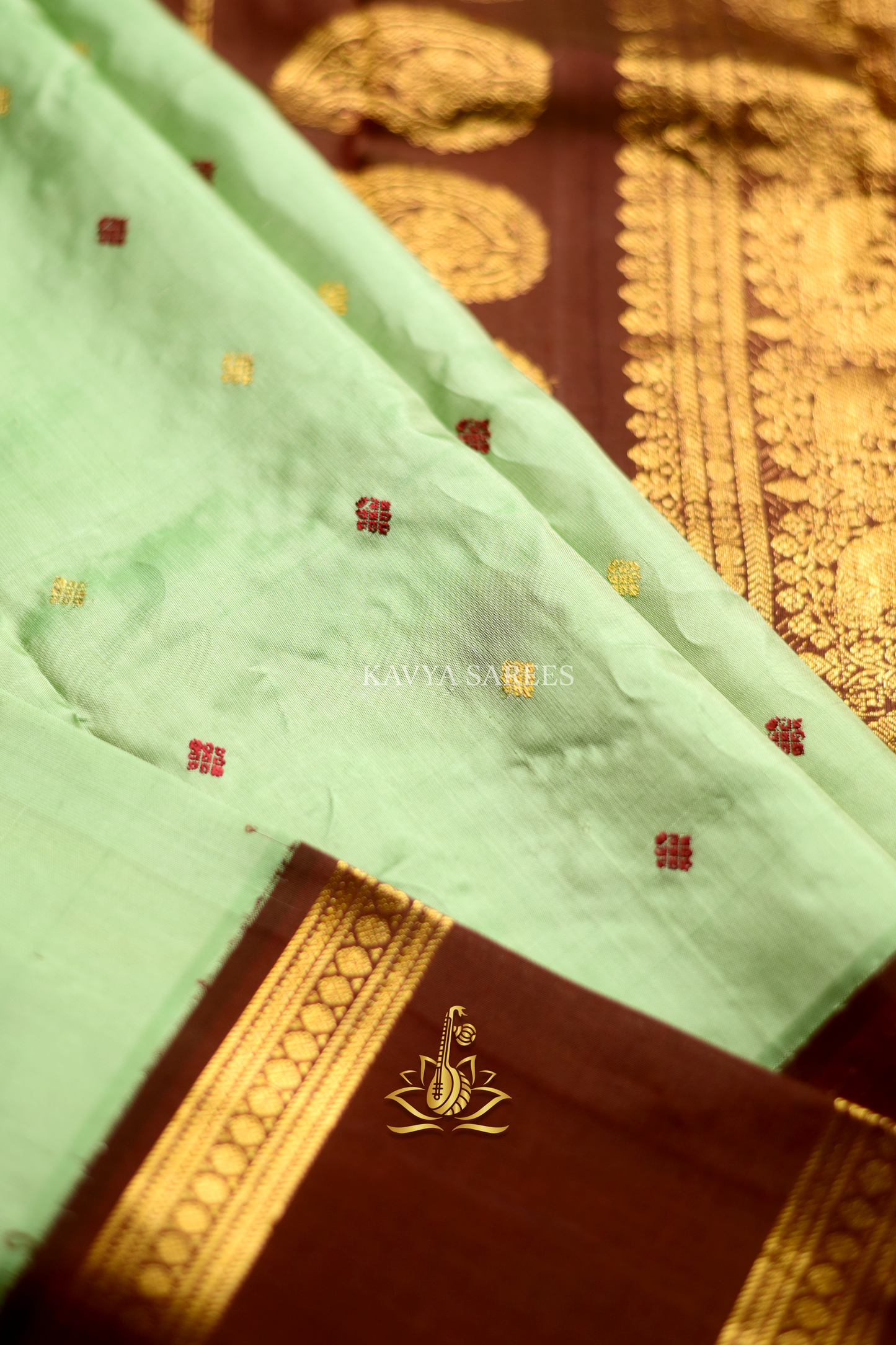 Mint Green Gadwal Pattu Saree with Rich Chocolate Brown Zari Border