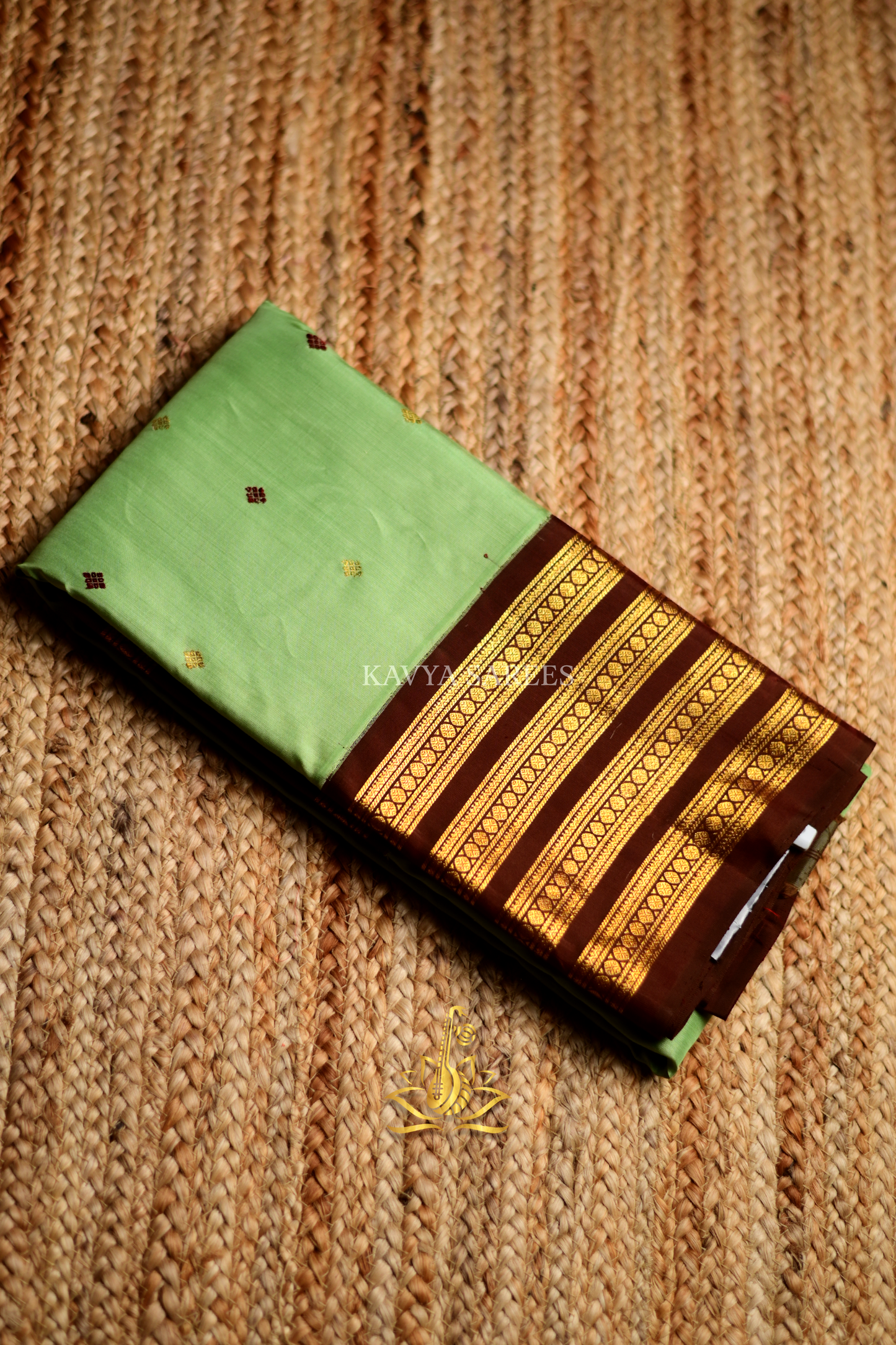 Mint Green Gadwal Pattu Saree with Rich Chocolate Brown Zari Border