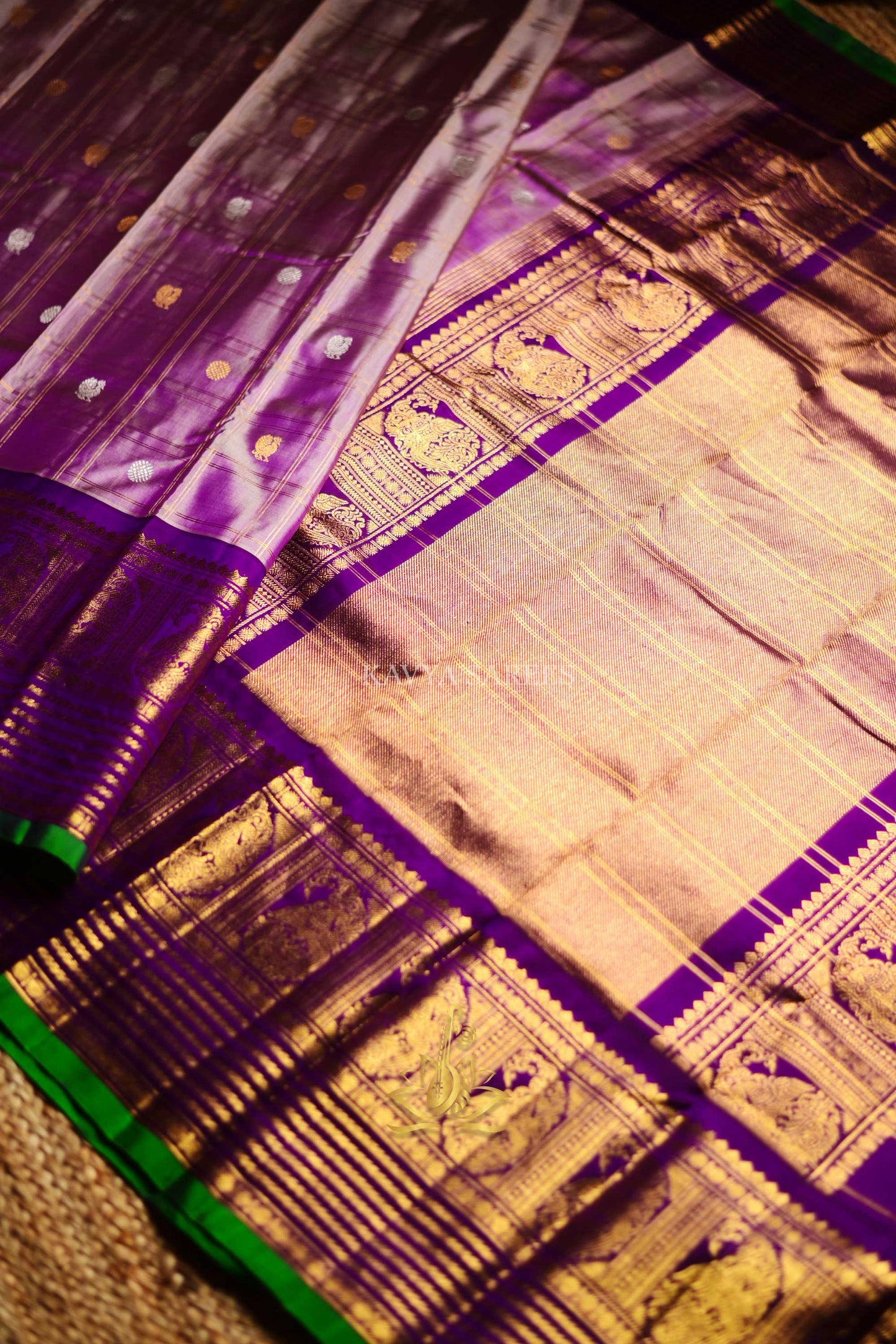 Gadwal Pattu Silk Saree in Lavender with Royal Purple & Green Zari Border