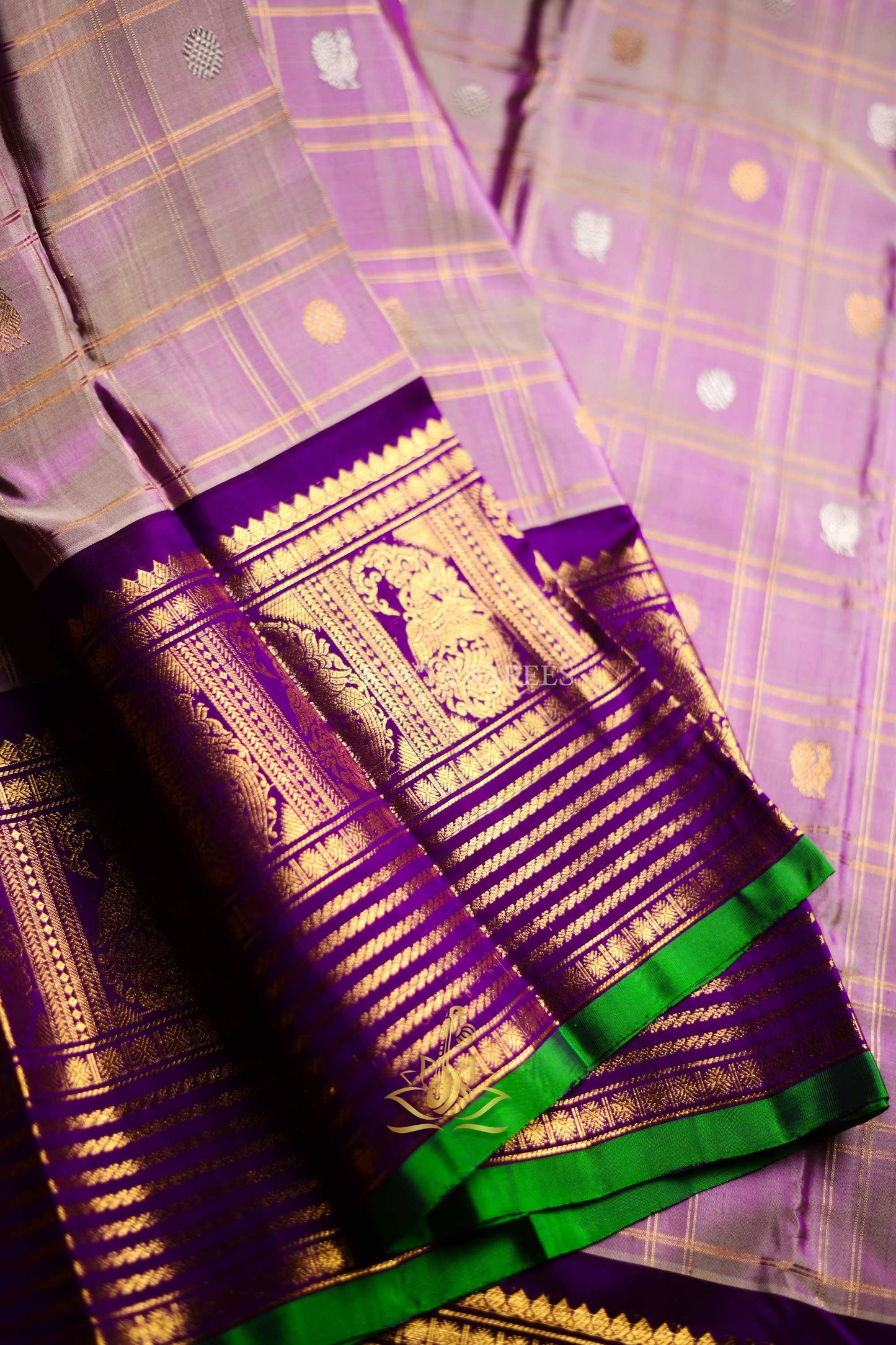 Gadwal Pattu Silk Saree in Lavender with Royal Purple & Green Zari Border