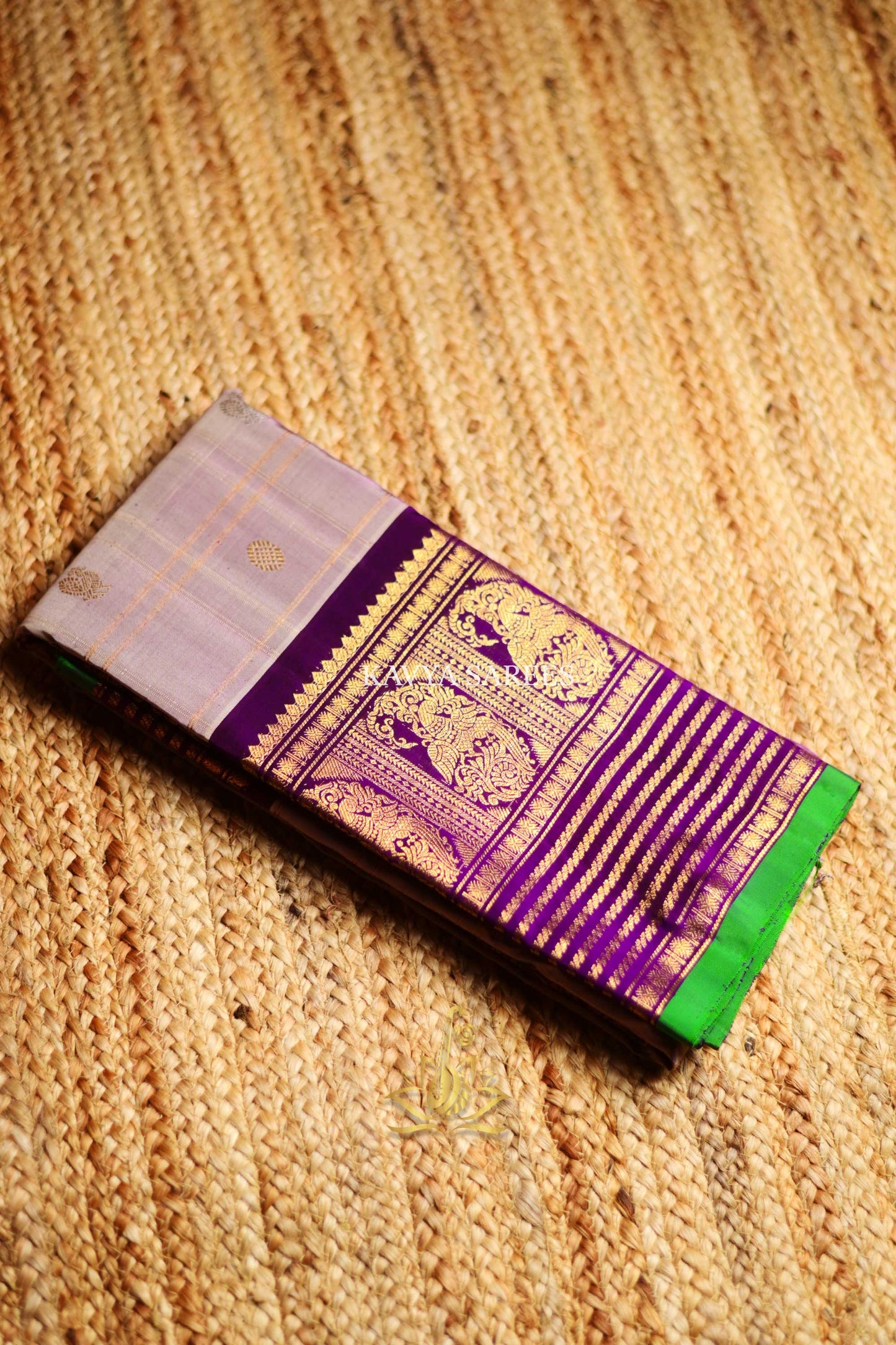 Gadwal Pattu Silk Saree in Lavender with Royal Purple & Green Zari Border