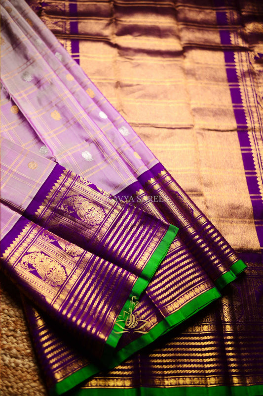 Gadwal Pattu Silk Saree in Lavender with Royal Purple & Green Zari Border