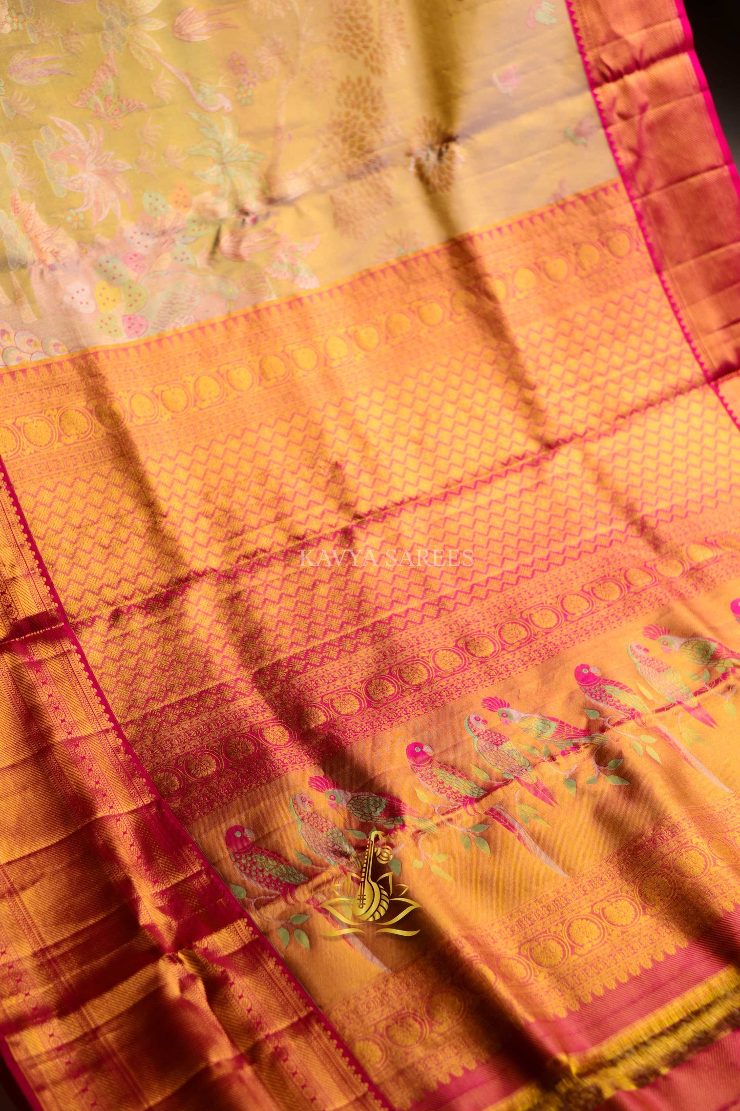 Elegant Kanchi Pattu Silk Saree with Artistic Motifs & Rich Zari Border
