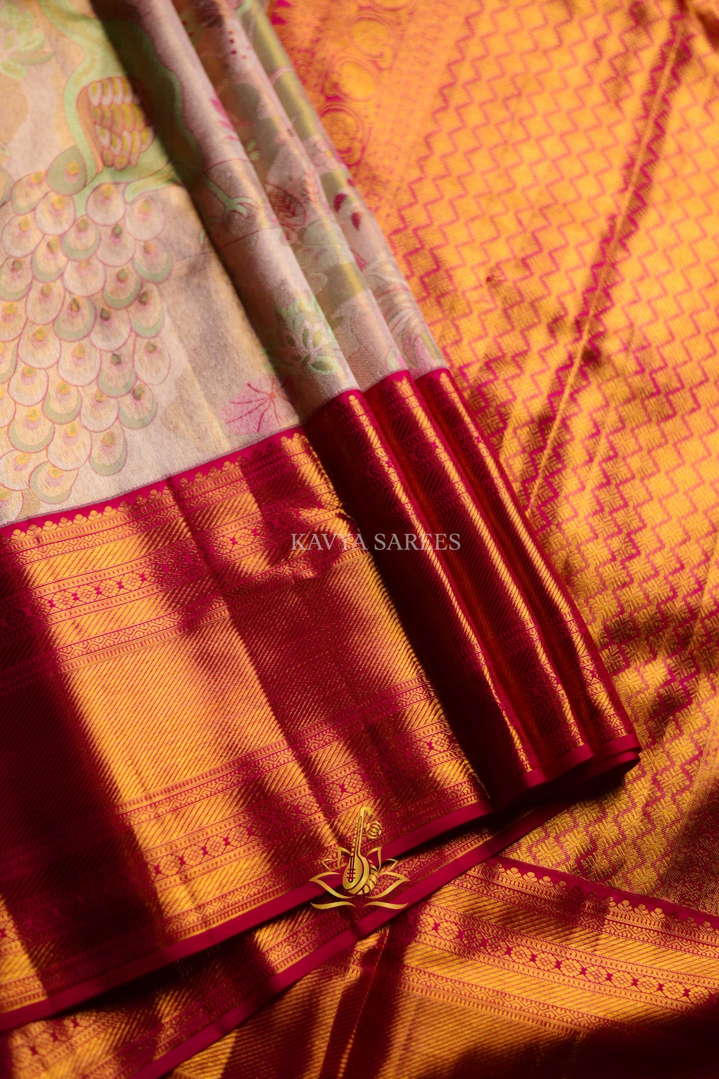 Elegant Kanchi Pattu Silk Saree with Artistic Motifs & Rich Zari Border